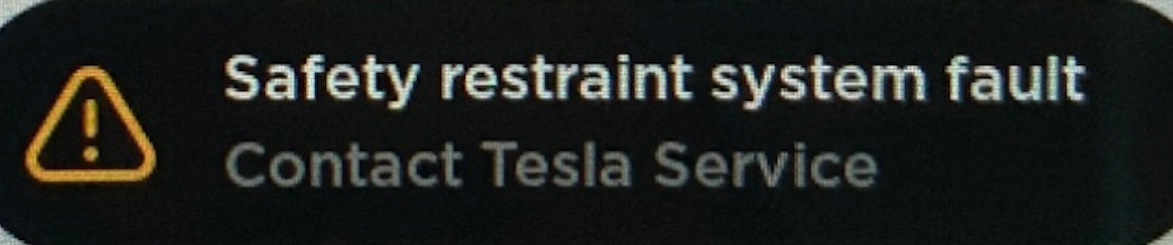 Tesla "Safety restraint system fault" alert clear
