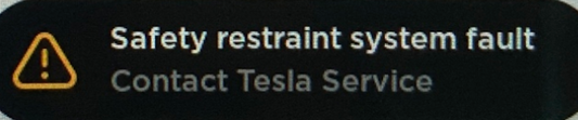 Tesla "Front passenger safety restraint system fault" alert clear